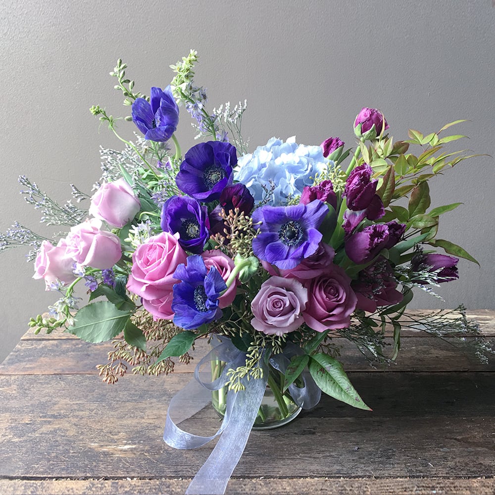 Send these gorgeous blooms in stunning hues of blues and purples! This