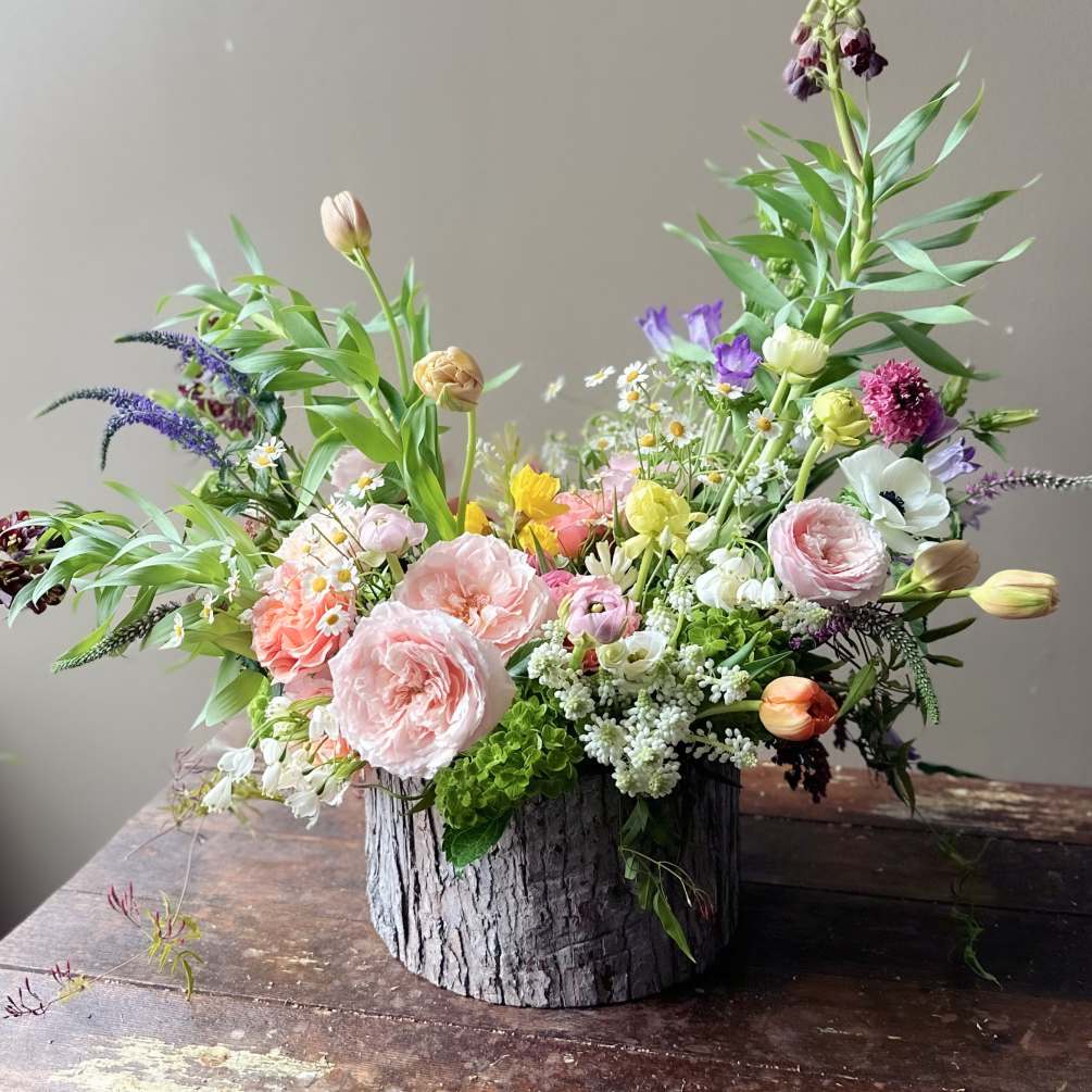 A light filled bouquet that feels like Spring itself, will surely brighten