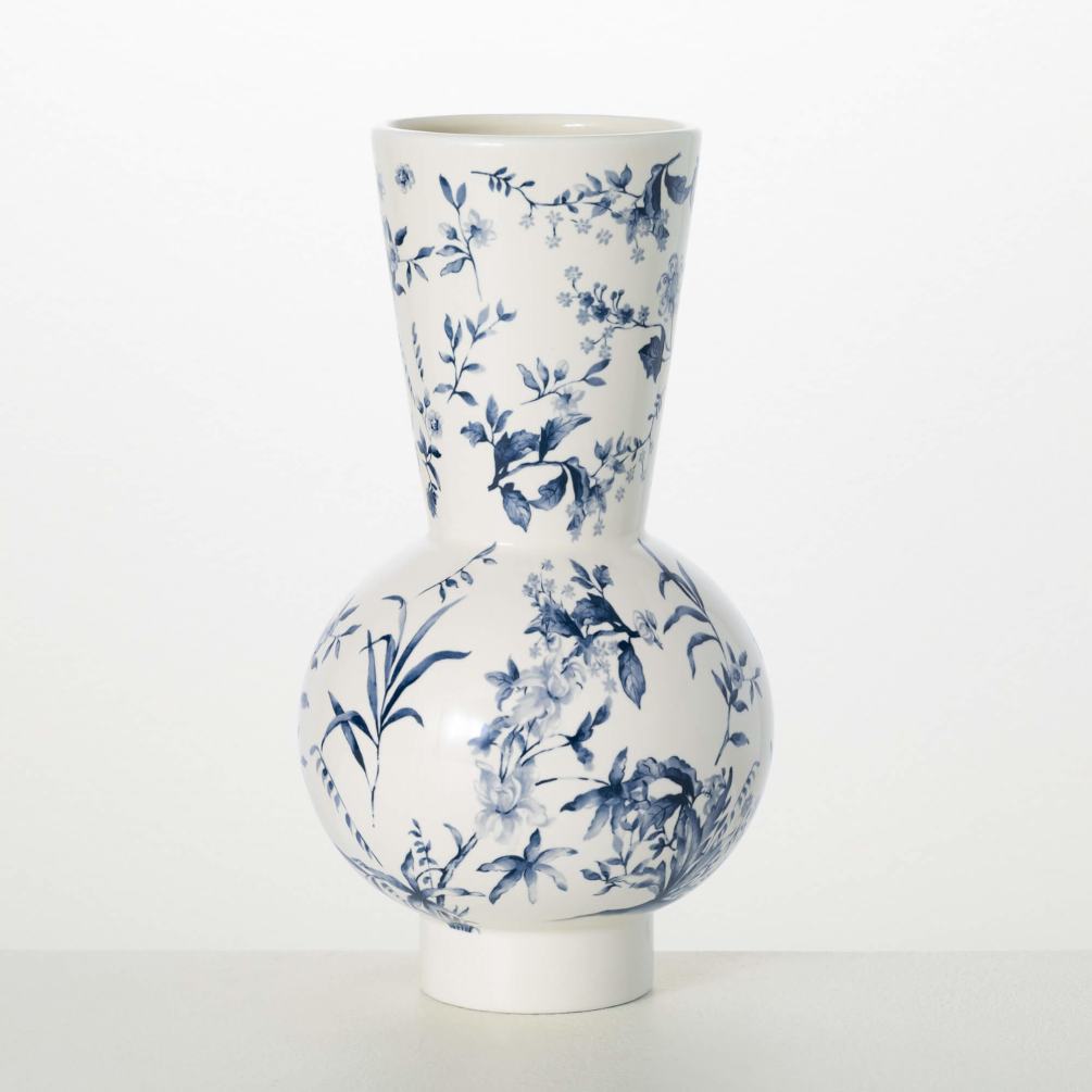 This vase features blue floral artwork on a stylish, modern shape. Designed