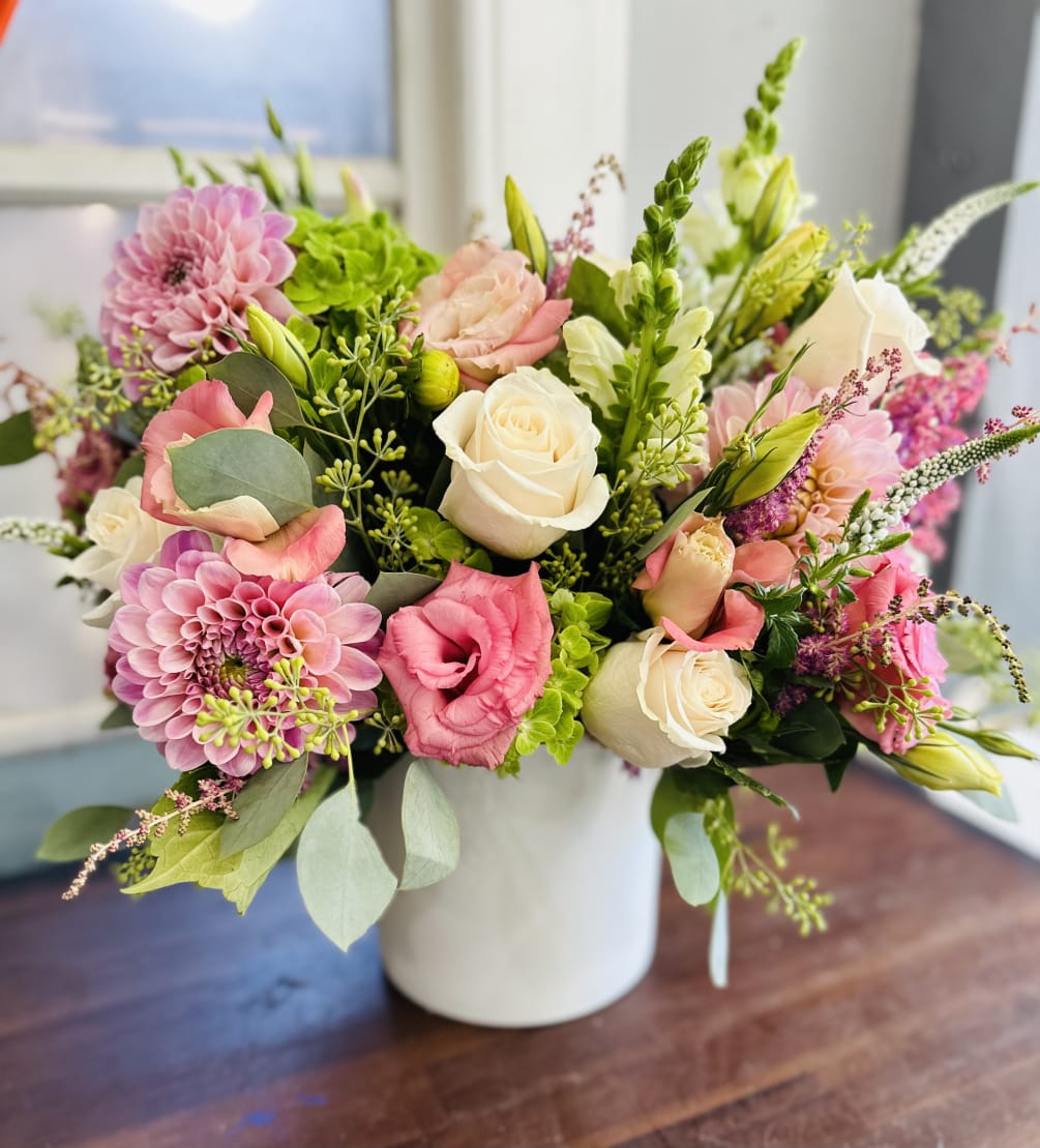 Dahlias in blush surrounded with blushes and pinks complimented with cream vendella