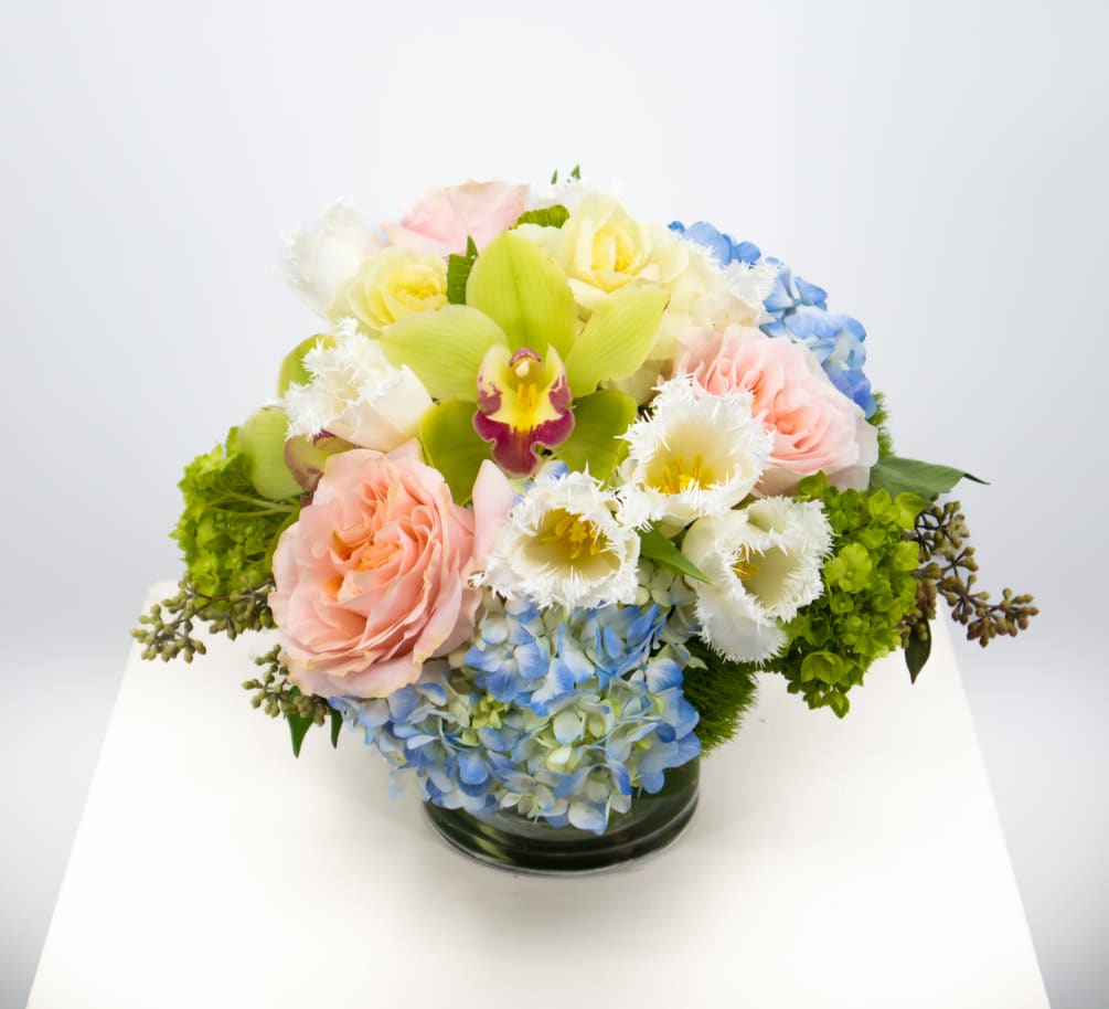 This pastel mixture with fragrant flowers is perfect to show anyone that