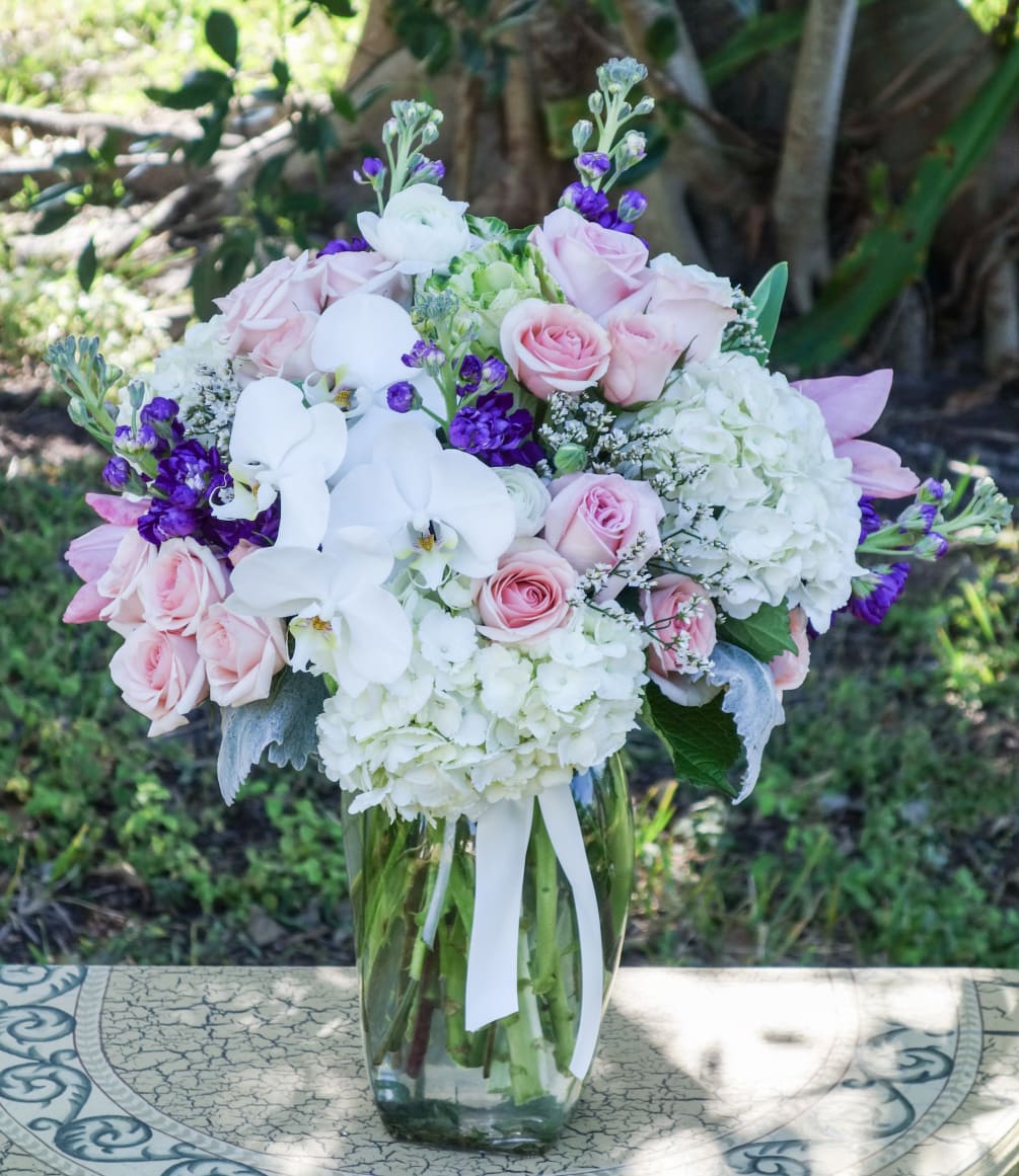 Gorgeous hydrangeas, spray roses, roses, stock, tulips, orchids, cale flower, dusty miller