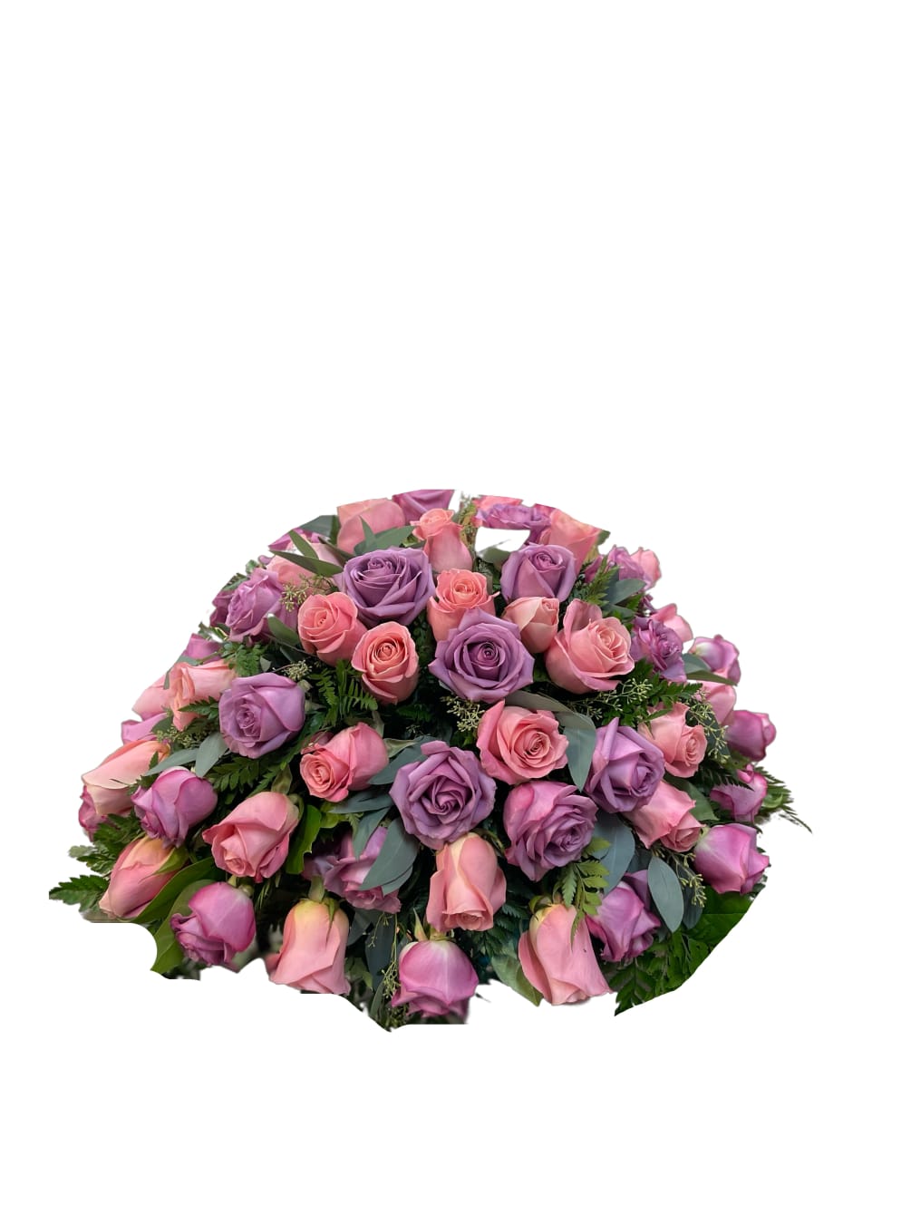 A casket saddle with all roses, pink and roses with an accent