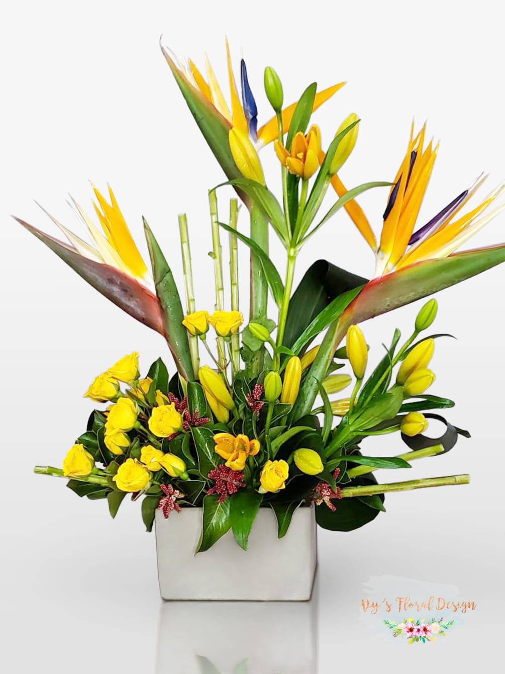 Tropical Paradise Creation, a vivid and lively arrangement featuring the captivating presence