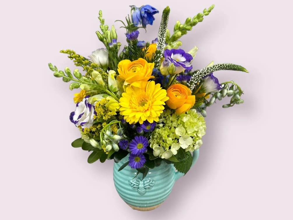 Everyone&#039;s abuzz about this beautiful bouquet! Lush spring mix blooms in a