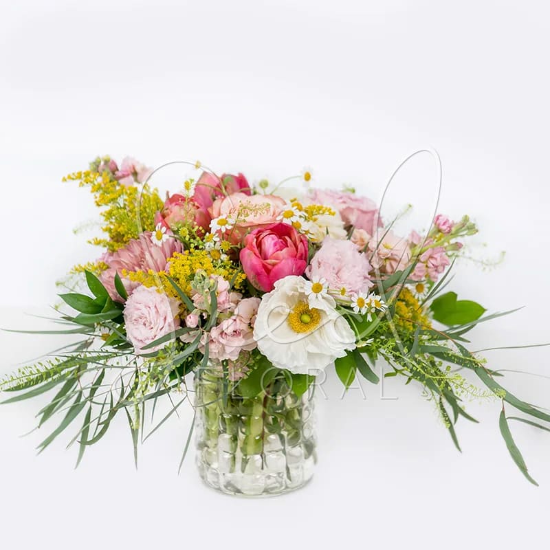 Fun &amp; Bubbly, this arrangement features the seasons most&nbsp;well known florals arranged