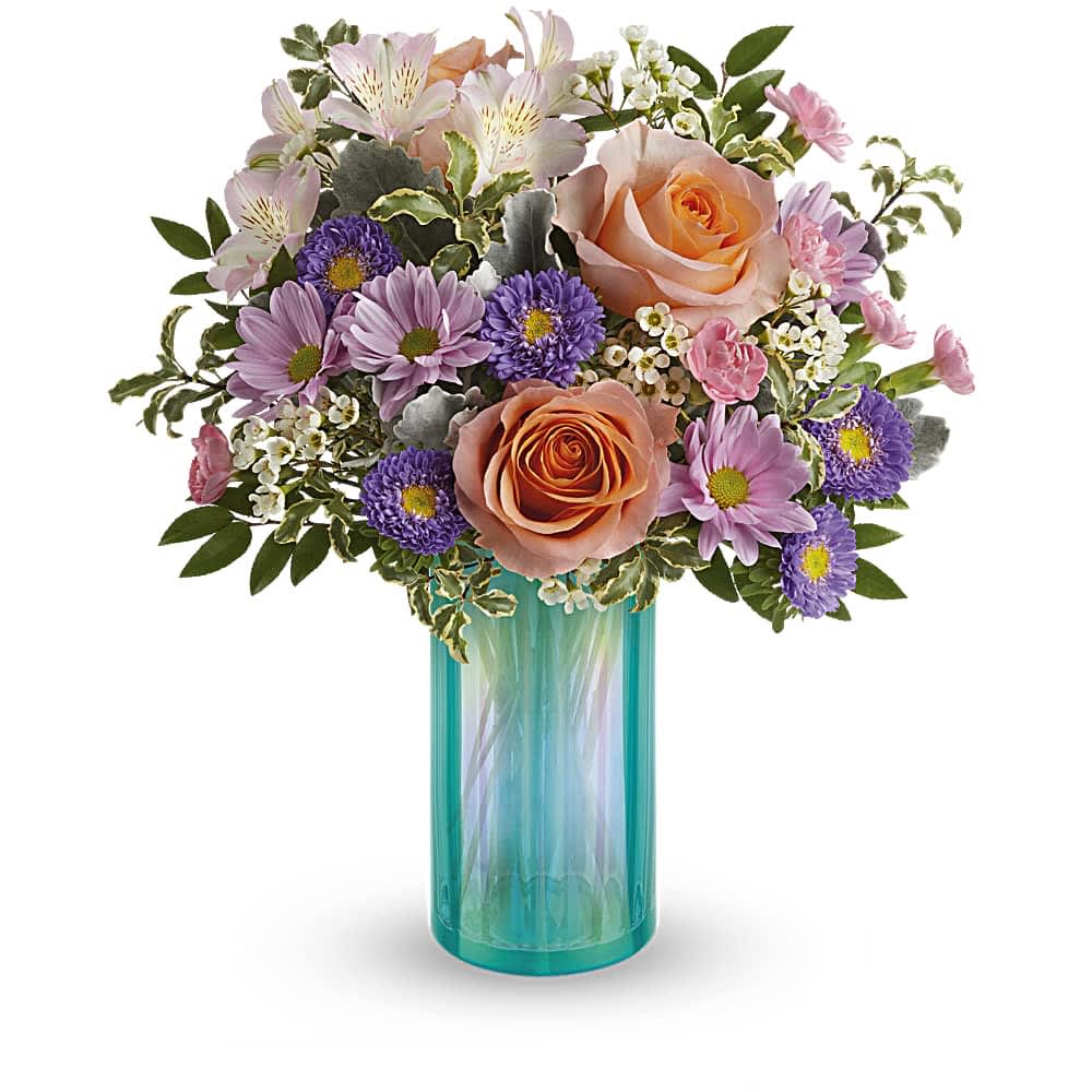 This floral arrangement features the sweetest shades of spring in one whimsical