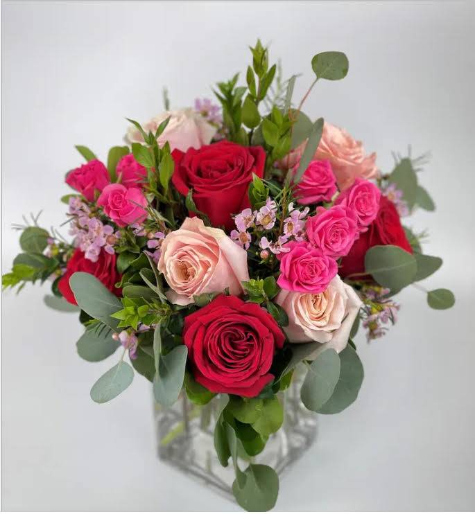 A beautiful, bright arrangement for your other half. 

Delivery minimum is $50.00
Our