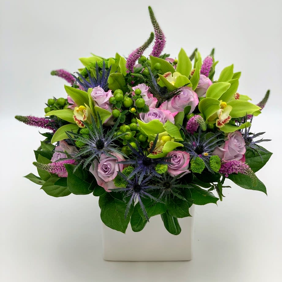 An exotic bouquet with a combination of lavender Roses, purple veronicas, Green