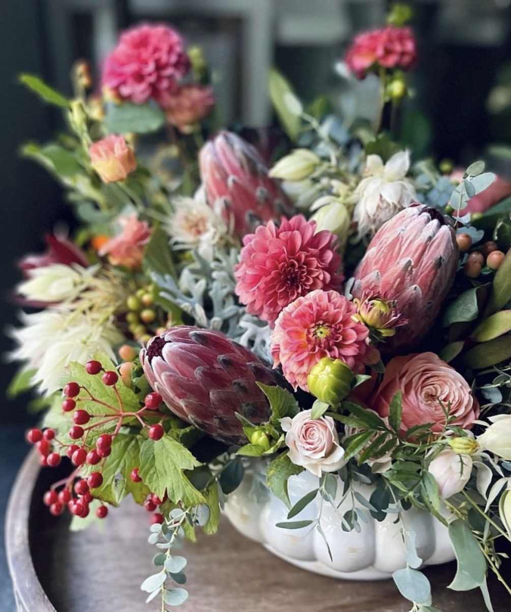 The presence of protea in the flower arrangements truly adds a special
