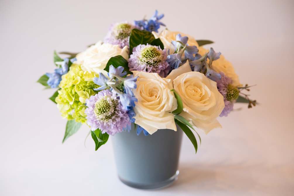 Lavender is a floral composition made with fresh seasonal blooms that reflects