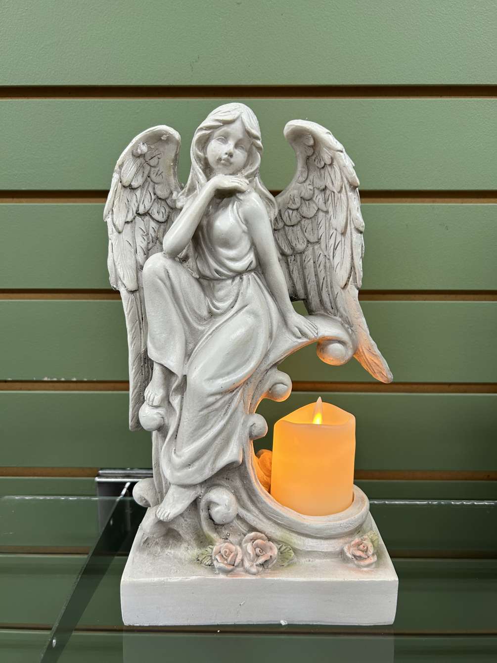 This combination of an angel memorial statue and an LED flameless candle