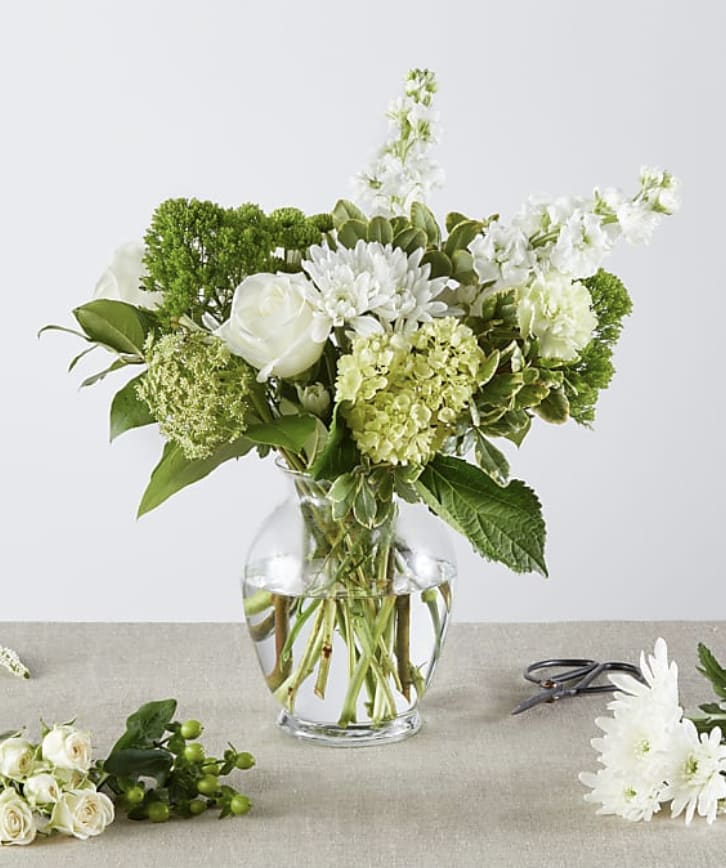 A lush vase of white and green florals to start the spring
