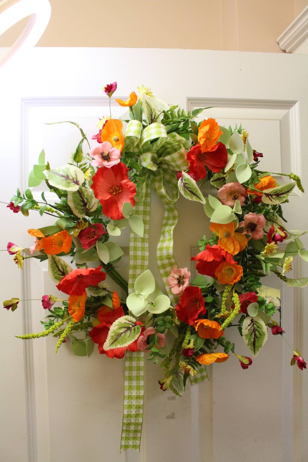 a wreath for your front door.  Perfect for the summer, bright
