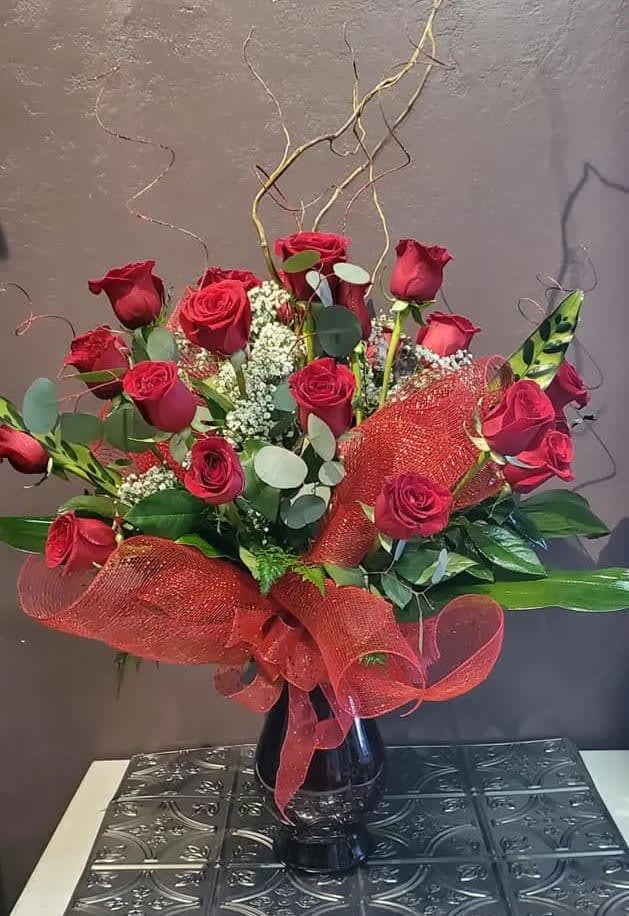 18 Red Roses Embellished With all the Extra Flair.
 Perfect for the