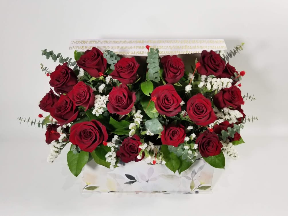 Box of 18, 24, or 36 roses, statice, eucalyptus and greenery.