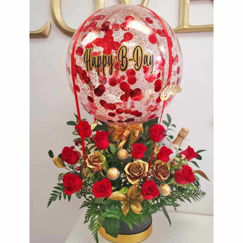 Cute Flower Arrangement, designed with Red and Golden Roses and a personalized