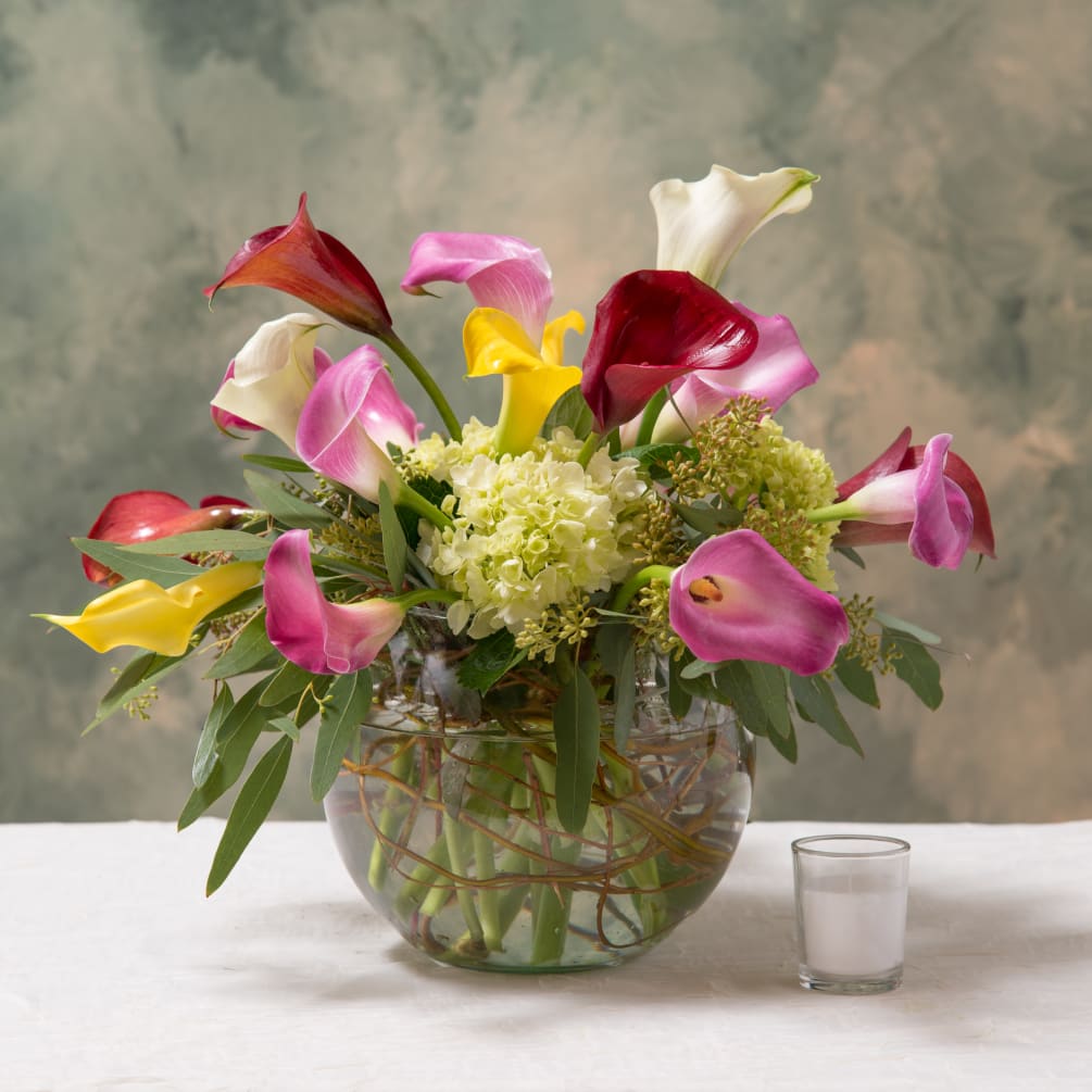 A gasp-worthy combination of calla lilies. This arrangement has luxurious textures that
