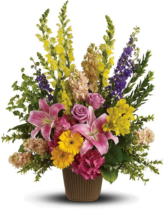 his gorgeous array of roses, lilies and other favorites is a beautiful