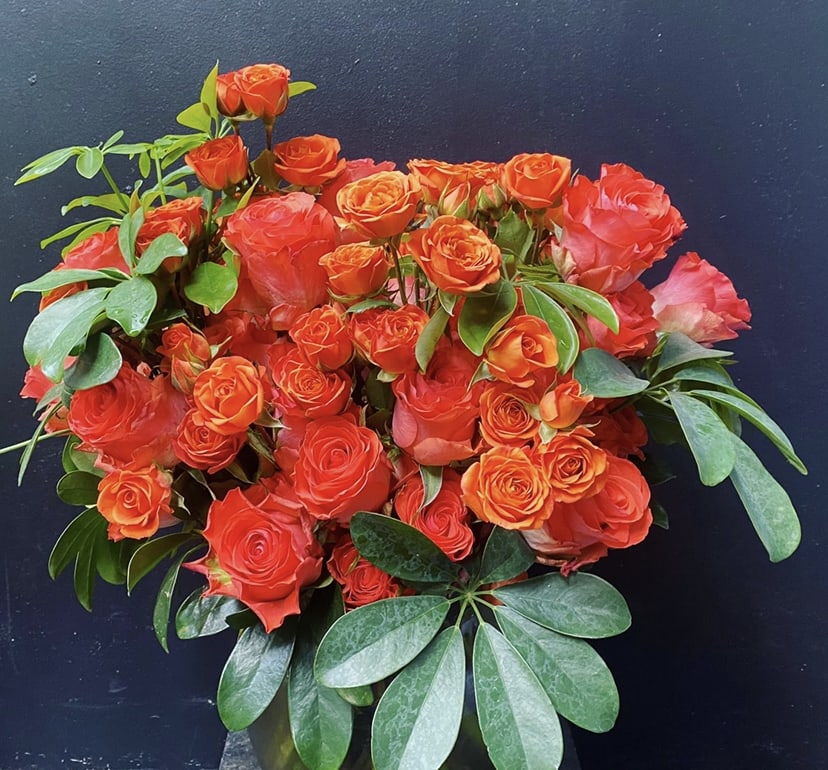 4 dozen rose arrangement. Grand pave style concept in a glass vase.