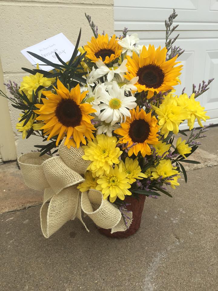 This Sunflower basket with white and yellow daises and sunflowers, is the
