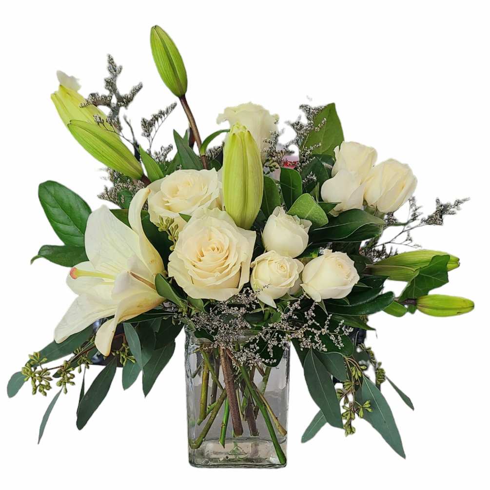 Arrangement with white blooms and beautifully scented  eucalyptus. 
