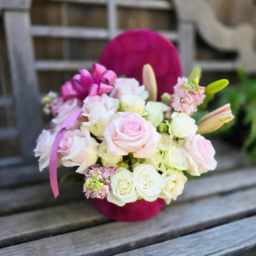 &quot;The Mulberry Cloud&quot; is a delectable assortment of pink roses, white spray