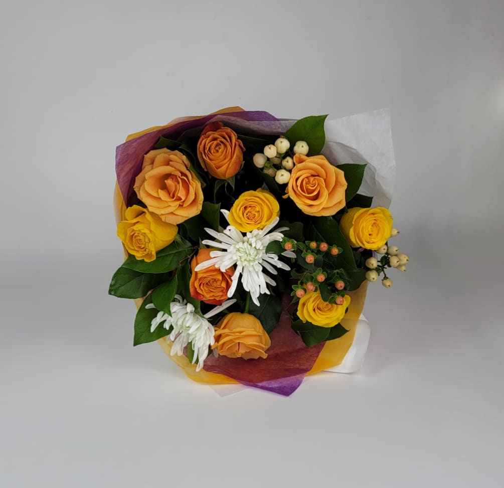 A hand tie bouquet with roses, greenery and fillers 

(you can ask