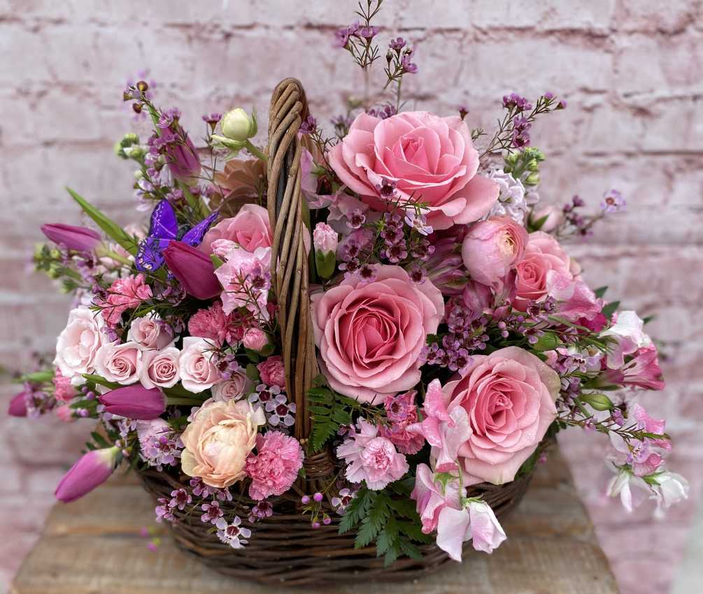 A gorgeous assortment of Rose, Tulips, Sweet Peas, Gerbera Daisies, Mini Hydrangeas
