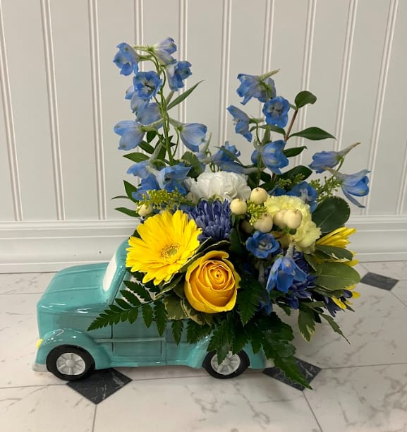 Rev their engines with a wondrous spring bouquet bundled in this adorable