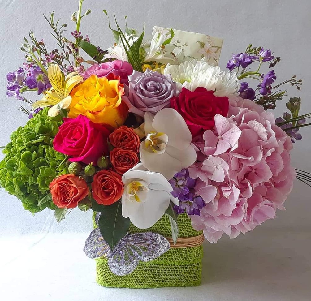 Send this designer&#039;s choice colorful blossoms beauty bouquet today to show them