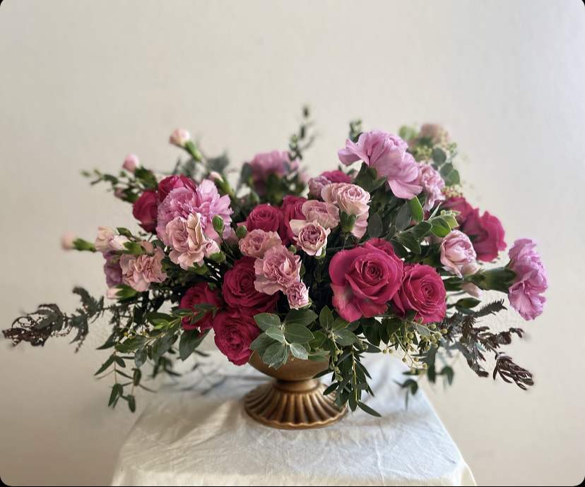 This elegant arrangement of pink florals is an April May Flowers original