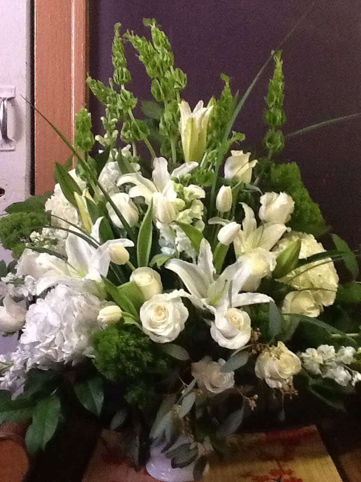 traditional funeral basket all white flowers with touch of greens