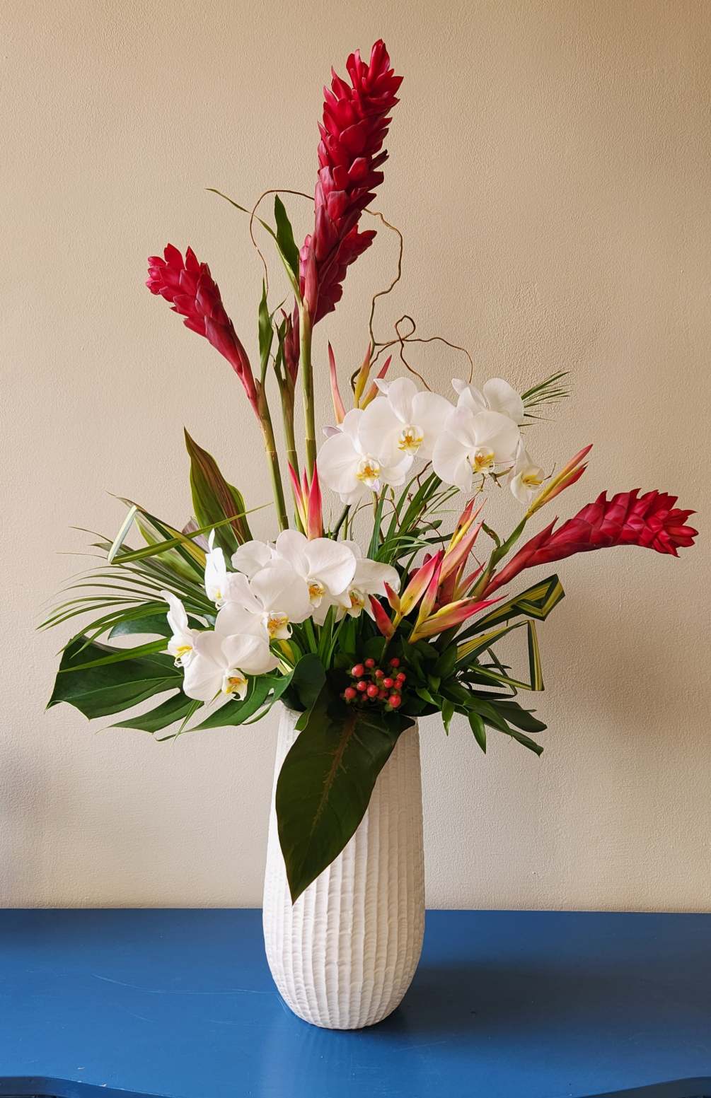 We will choose the freshest quality blooms for a tropical mix arrangement.
Flowers