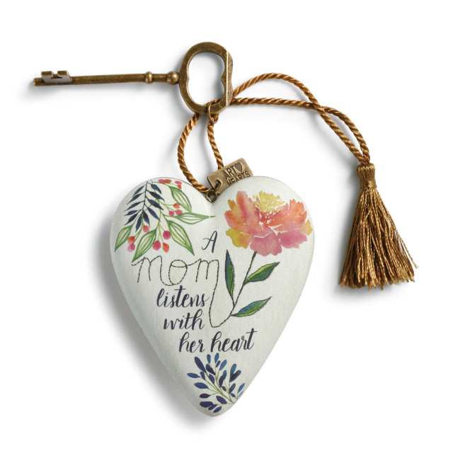 Decorative heart that can either hang or stand using the ornamental key