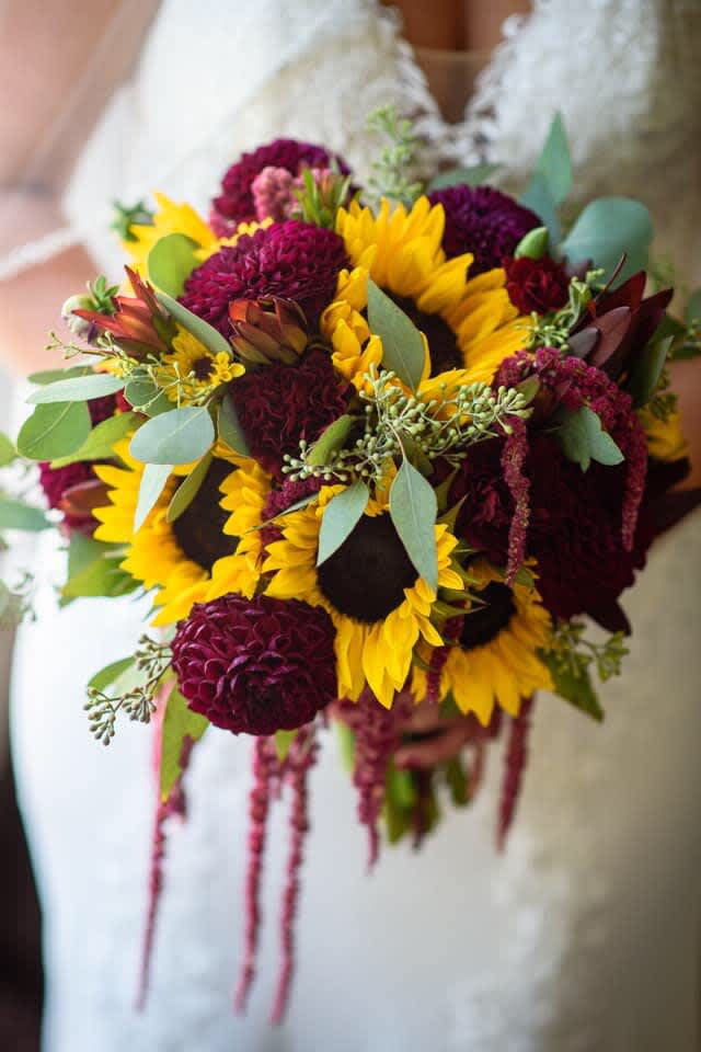 Our Emma Collection includes sunflowers, hanging amaranthus, dahlias, leucadendron, carnations, mini carnations
