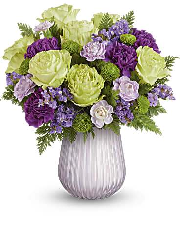 Sweet as can be, this pretty purple and green bouquet gets a