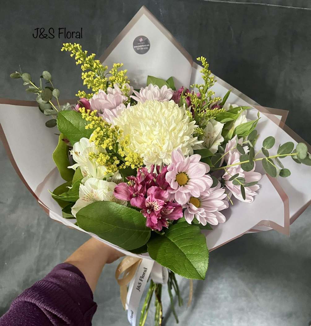 introducing Our New Design Luna hand tied bouquet, beautifully arranged with mum