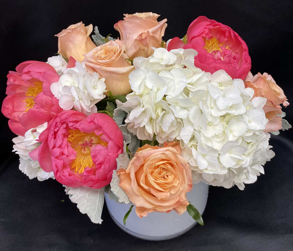 Roses and Peonies in an elegant white cylinder