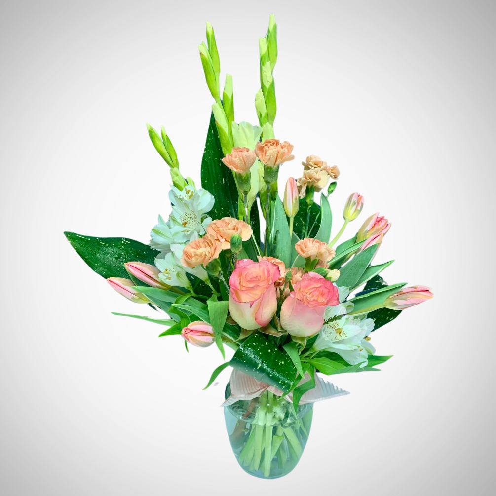 Spring in a vase!  Fresh and delightful floral arrangement is sure