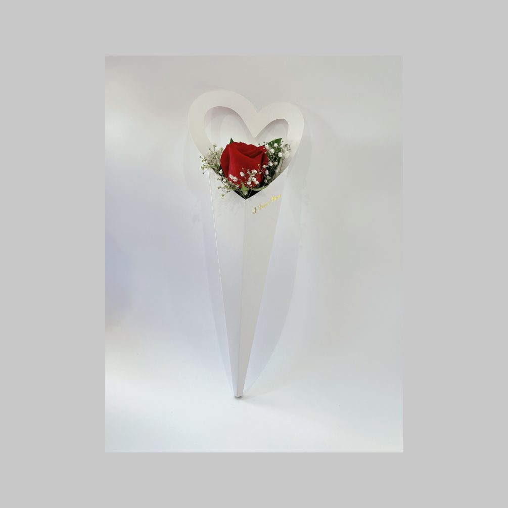red roses in a cute heart pattern paper box