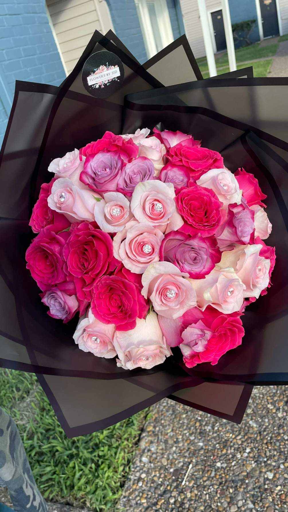 Hand tied bouquet of pink and hot pink roses, 100% fresh cut