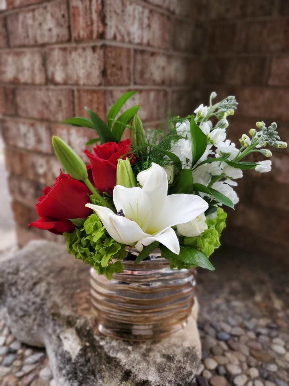 Compliment a modern girl with a modern flower arrangement! We carefully arrange