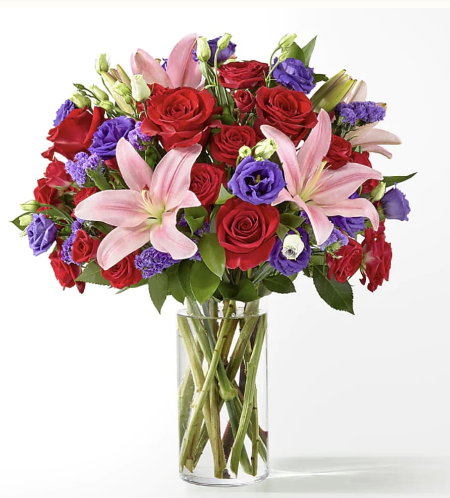 This dreamy jewel toned bouquet combines bold color and eye catching texture