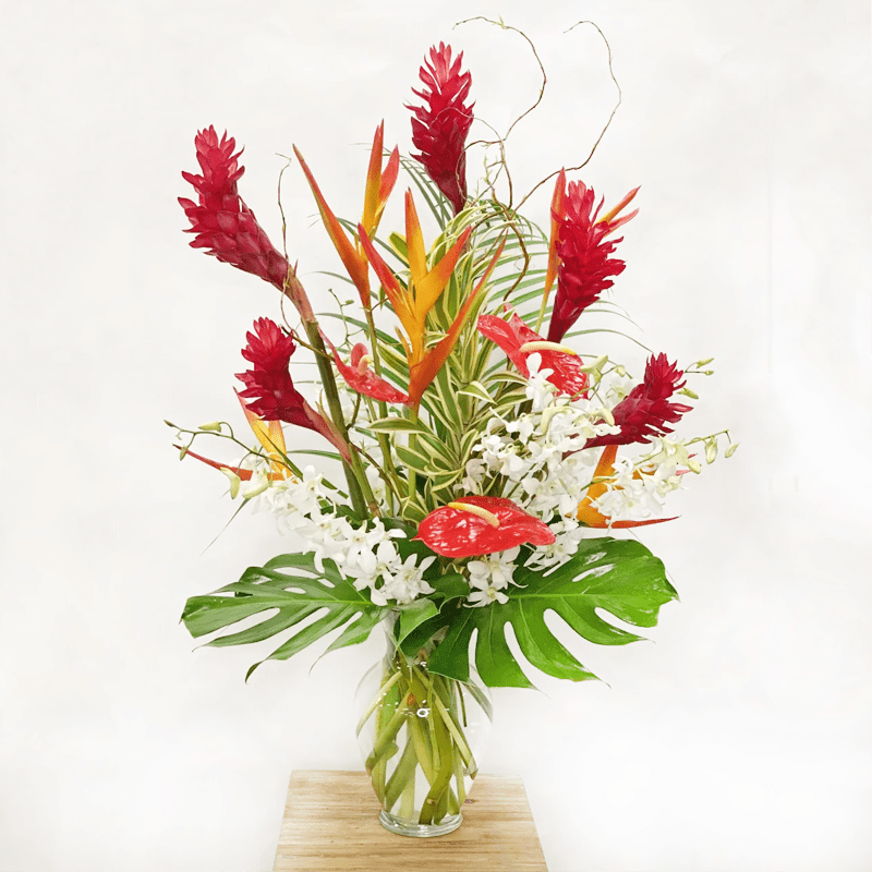 A large, stunning piece featuring a wide assortment of tropical, exotic flowers!