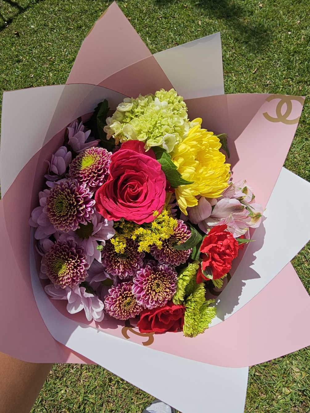 Colorful mix bouquet, wrapped in a luxury wrap. (chanel, gucci or louis