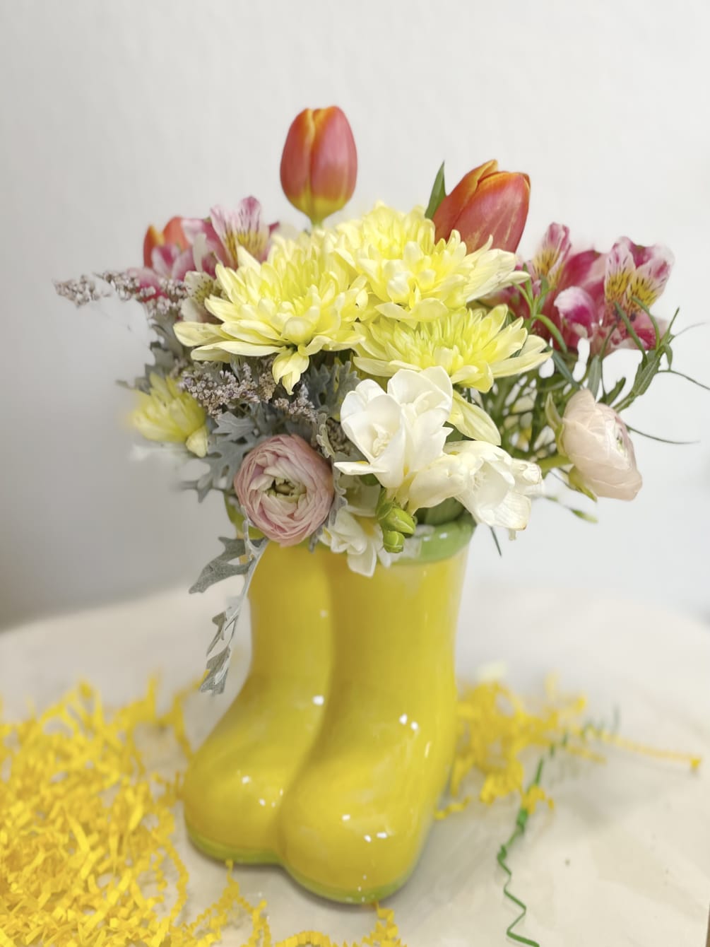 Brighten someone&#039;s day with these adorable rainboots, fashioned in a keepsake ceramic