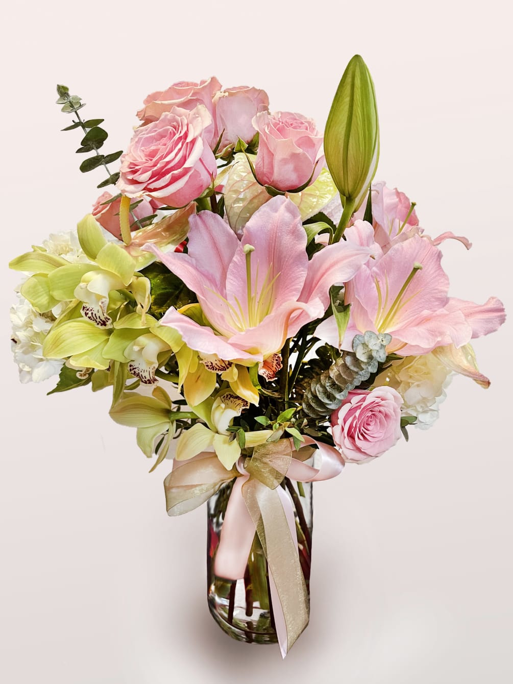 A mix of traditional and tropical flowers combine to create &quot;Sweet Elegance!&quot;