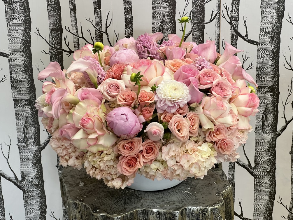 A beautiful arrangement of peonies, dahlias, roses, and more!