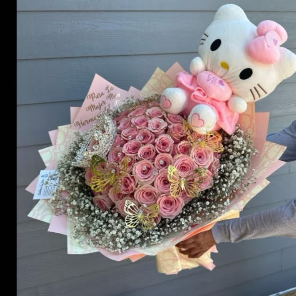 This Luxe Bouquet includes Pink roses, Baby&#039;s breath rim, Hello Kitty Plush
